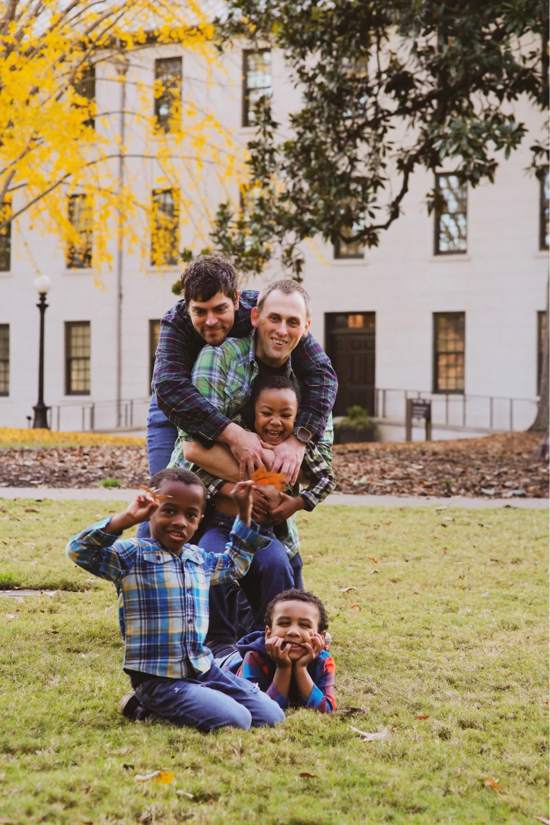 Josh, Kevin, and their three sons together